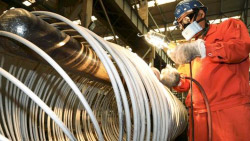 CNBC Article Image, Polishing Steel Coils